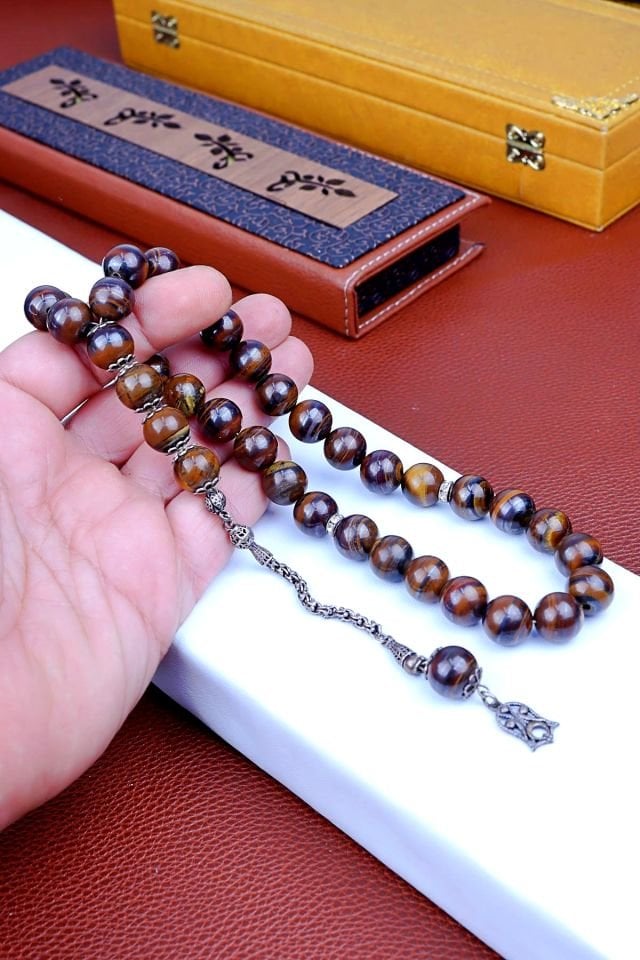 KAPLAN GÖZÜ TAŞI KİŞİYE ÖZEL  GÜMÜŞ PÜSKÜLLÜ TASARIM TESPİH