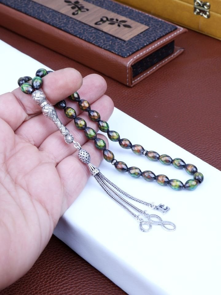 HİS TAŞI KİŞİYE ÖZEL GÜMÜŞ PÜSKÜLLÜ TASARIM TESPİH ( Kişi enerjisine göre 12 renk değiştiren dogaltaştır)