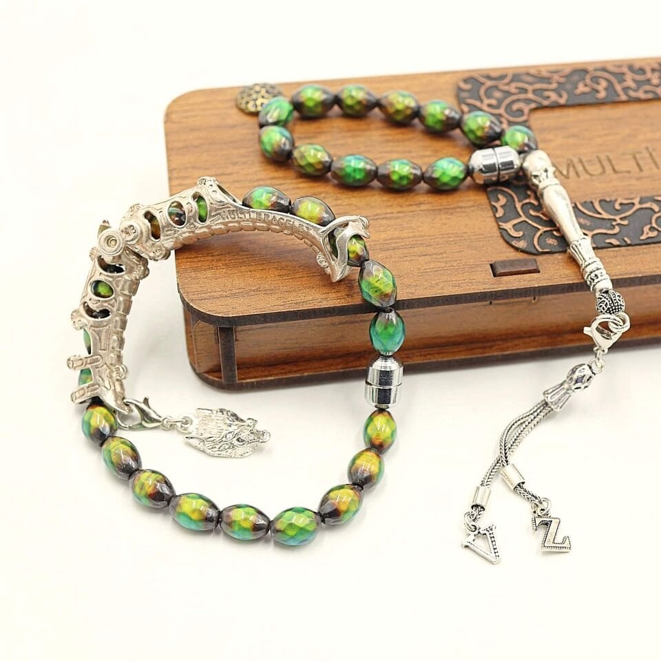 925 Ayar gümüş tasarımlı His taşı Multi Tespih (  Kişi enerjisine göre 12 renk değiştiren Orjinal dogaltaştır)