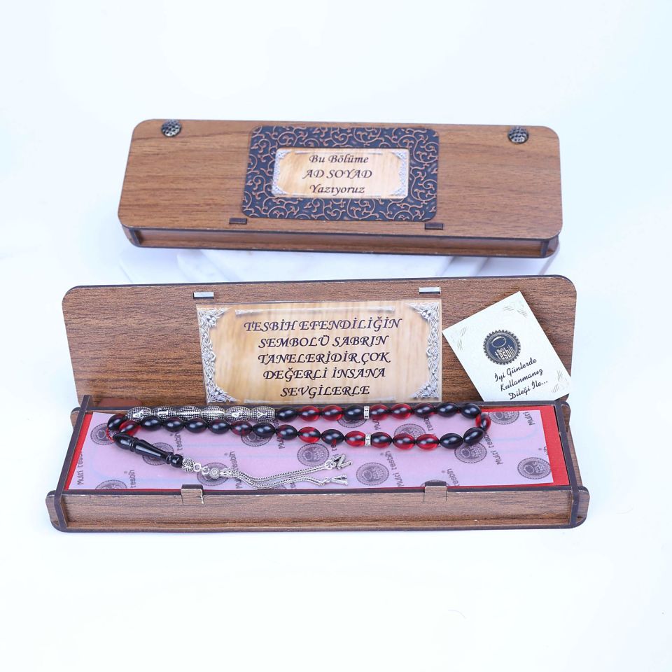 ATEŞ KEHRİBAR GÜMÜŞ PÜSKÜLLÜ TASARIM TESPİH