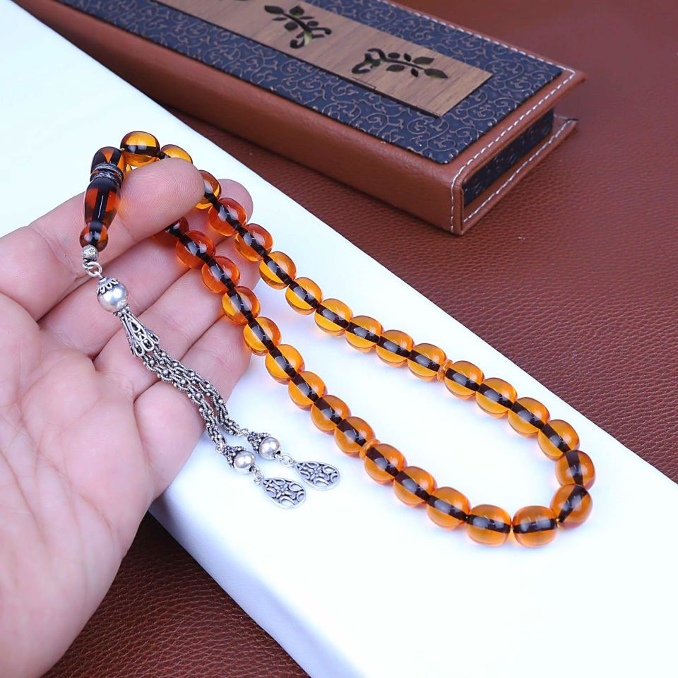 ATEŞ KEHRİBAR  GÜMÜŞ PÜSKÜLLÜ TASARIM TESPİH